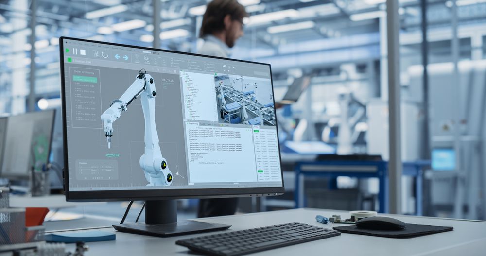 Modern Industrial Manufacture with Desktop Computer with Automation Software for Robotic Arm. Scientific Lab, Engineering Research Center with High-Tech Equipment, Technology for Robot Development