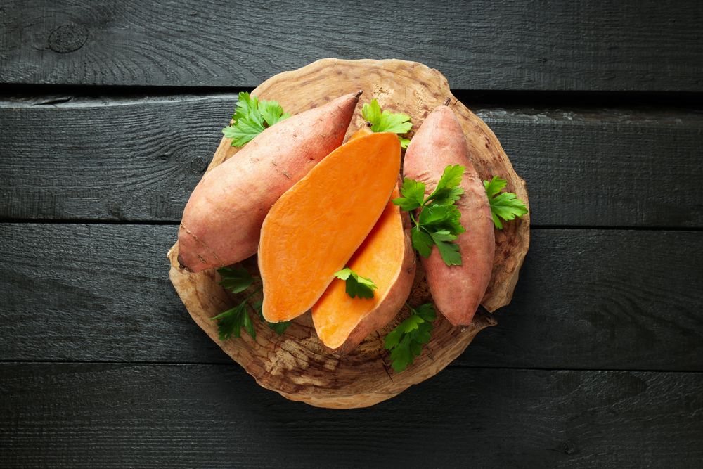 Concept of vegetables, sweet potato, top view
