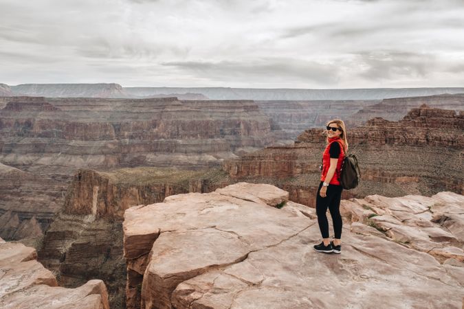 Calm female looking at pictorial landscape