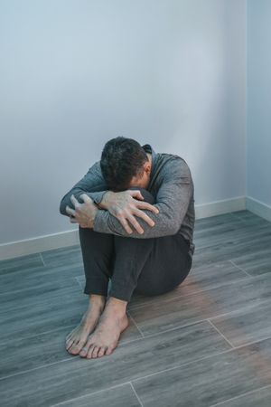 Unrecognizable desperate man with problems
