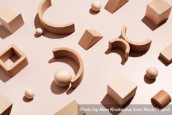 Different wooden shapes on neutral background 5nnwQ5