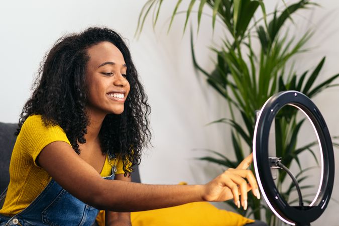 Young woman making videos for social media