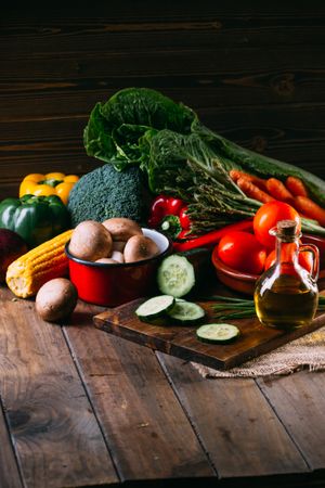 Vegetables and utensils on kitchen table