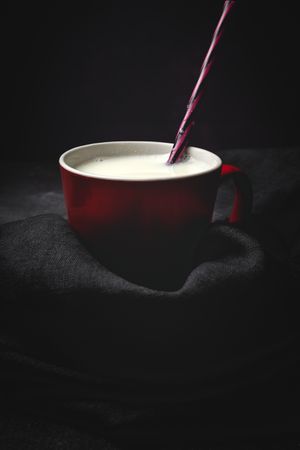 Cup of milk on table