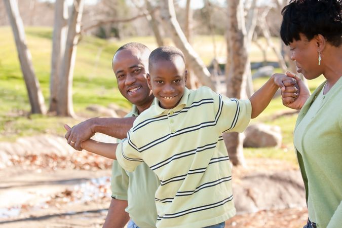 Happy Black Man, Woman and Child