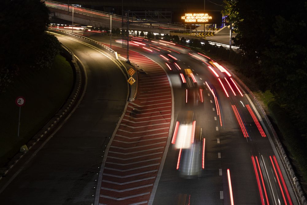 Night traffic in the city of Kuala Lumpur, Malaysia, seen from the bridges over Kuching Street