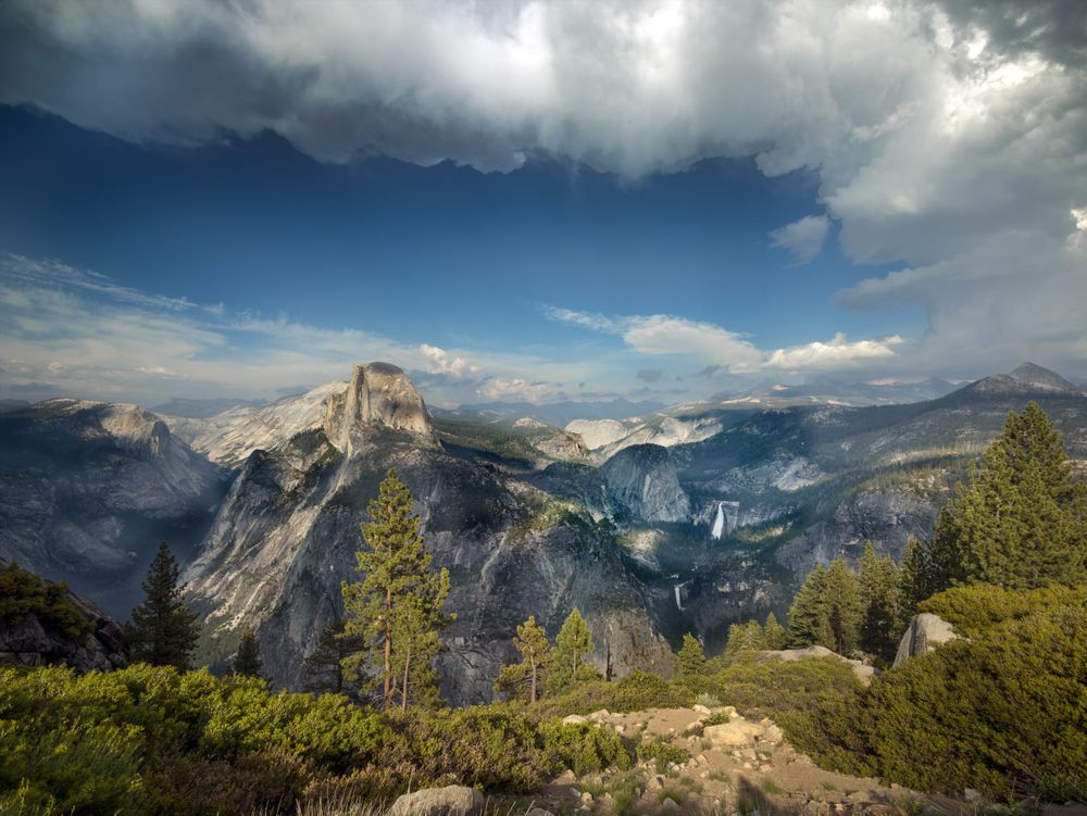 Sun-dappled view of Half Dome in Yosemite Valley
