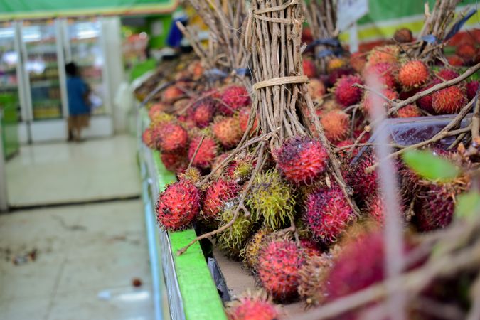 Bunch of lychee fruits for sale in grocery store