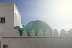 Green cupola on ancient building