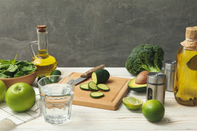 Concept of cooking salad on wooden table