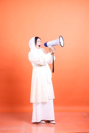 Empowered Voice, Woman with Megaphone Announcing News, She Uses