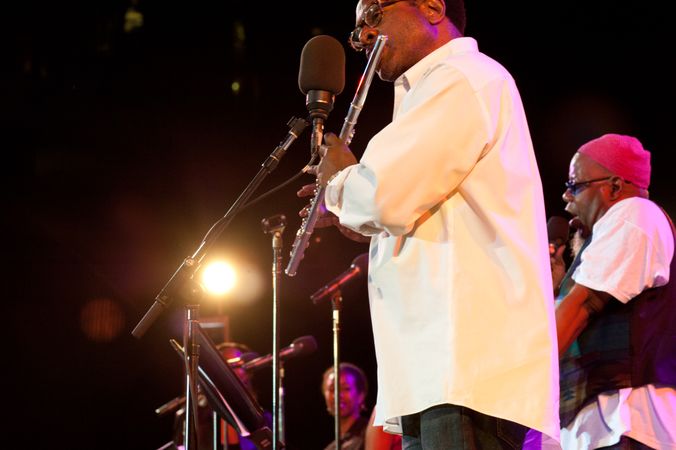 Los Angeles, CA, USA - July 12, 2012: Man playing flute with band onstage