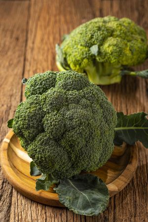Green organic broccoli on the table.