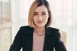 Woman in business attire in her office