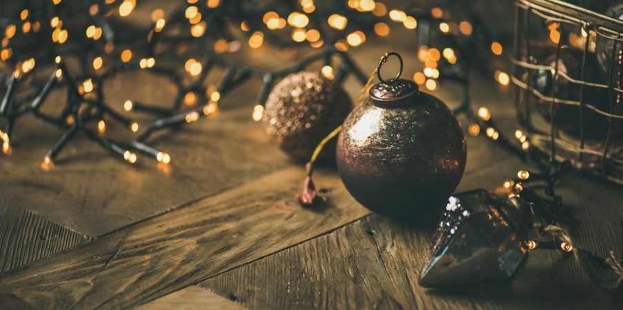 Christmas tree decorations, on wooden counter, close up, copy space, wide composition
