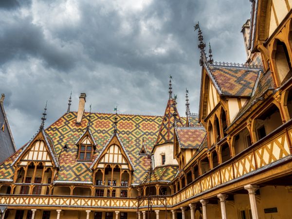Empty streets of the medieval city of Beaune in Burgundy. The stormy sky