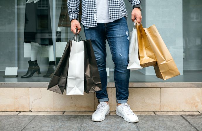 Low section of man shopping