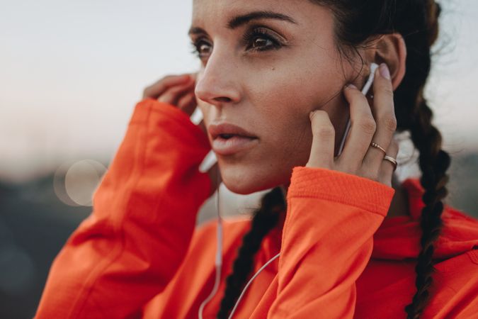Female athlete with earphones