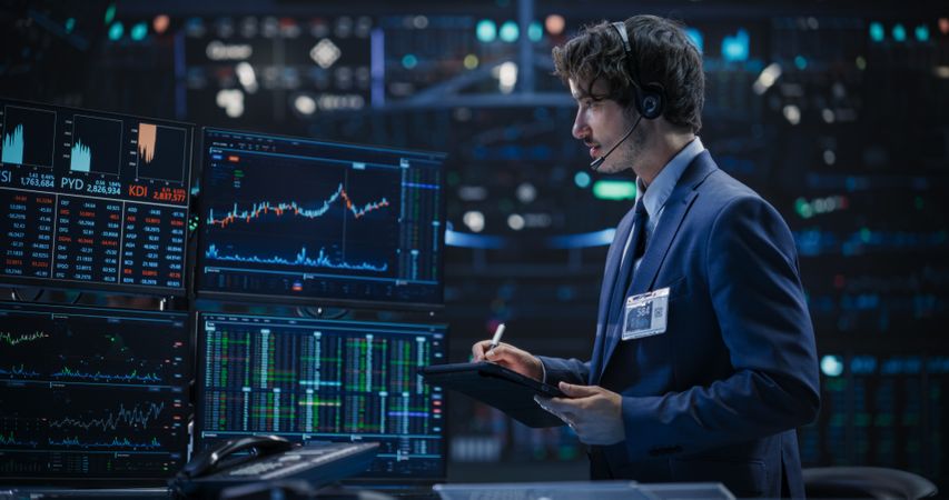 Portrait of a Young Man Working in an International Stock Exchange Company