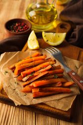 Concept of tasty food - sweet potato fries