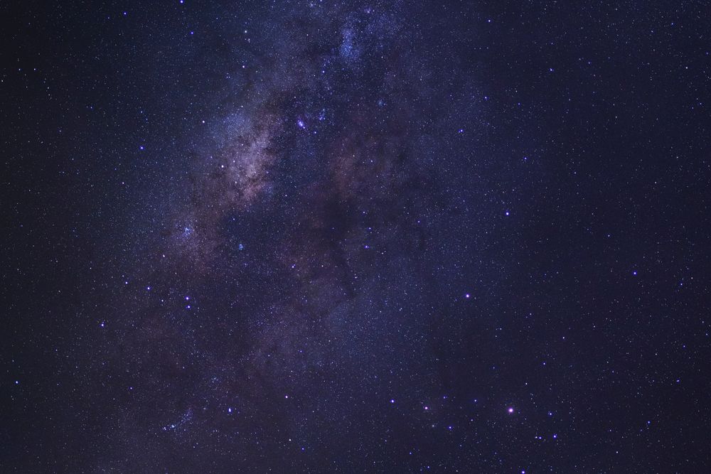 Starry night sky and milky way galaxy with stars and space dust in the universe