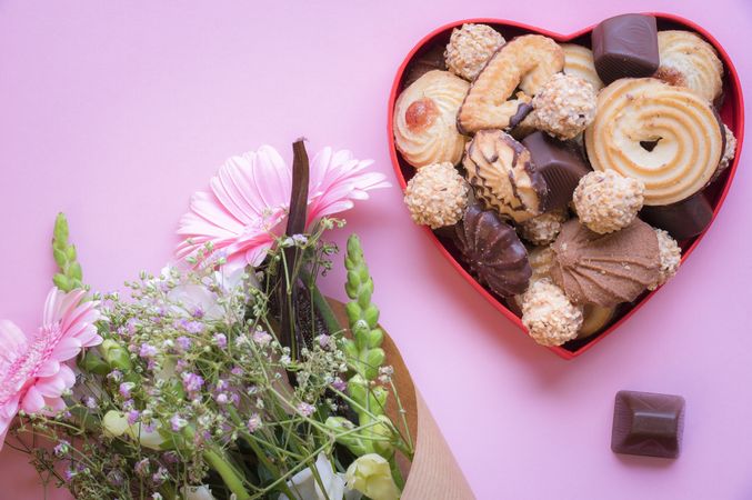 Heart shaped box with cookies and flowers