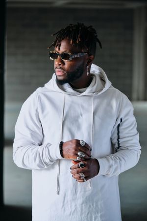 Stylish Black man in underground parking