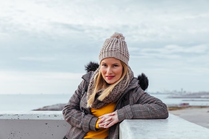 Portrait of blonde woman posing in the city