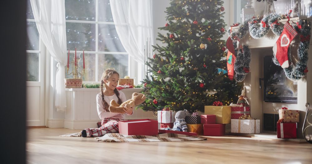 Cute Child Getting Her Gift from Santa