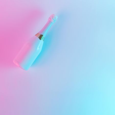 Champagne bottle with colorful ultraviolet holographic neon lights