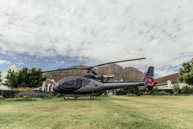 Private helicopter in a beautiful lawn