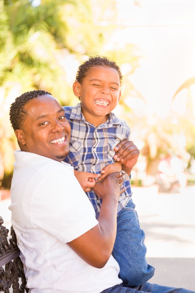 Portrait of Son and Father Outside Together.