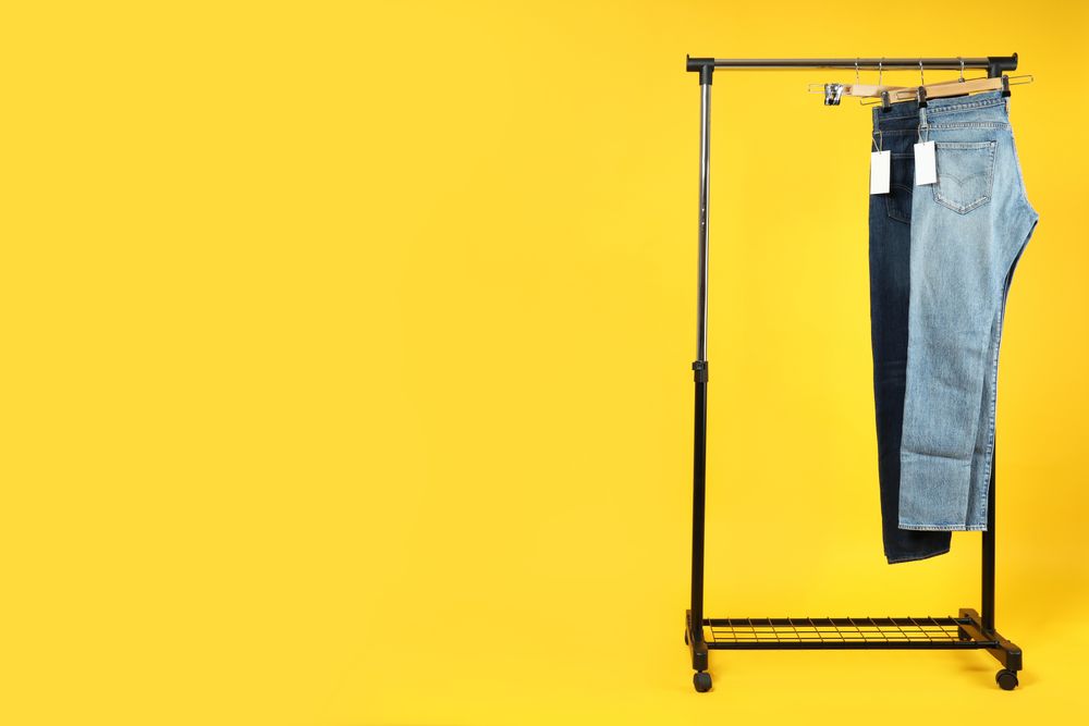 Jeans hang on hangers
