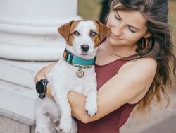 Woman hugging a dog
