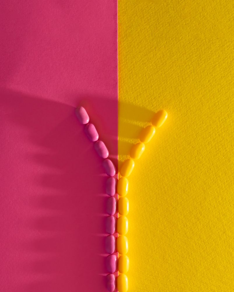Yellow and pink candies in Y shape