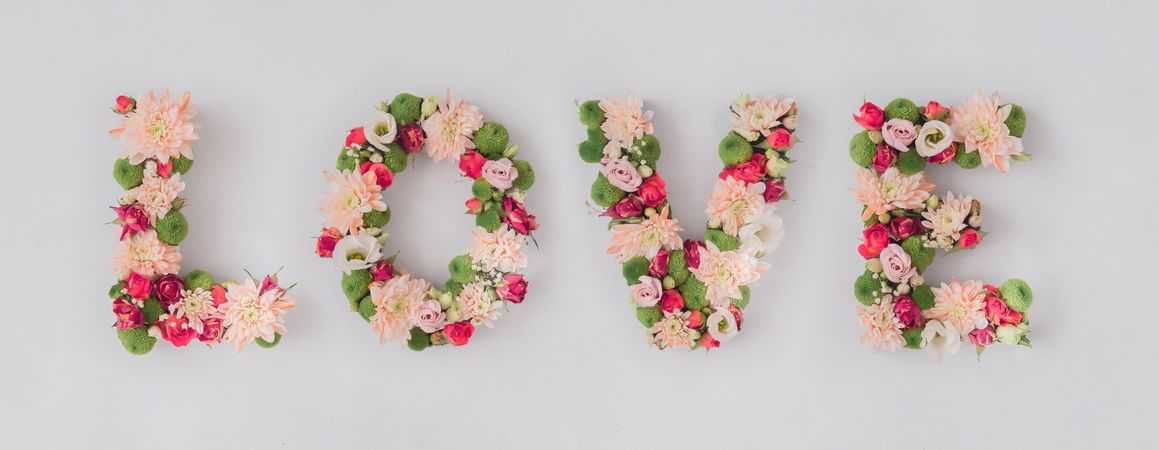 Word “LOVE” made of various flowers