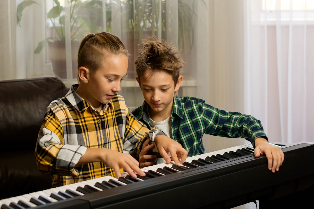 Brothers Practicing Piano Together
