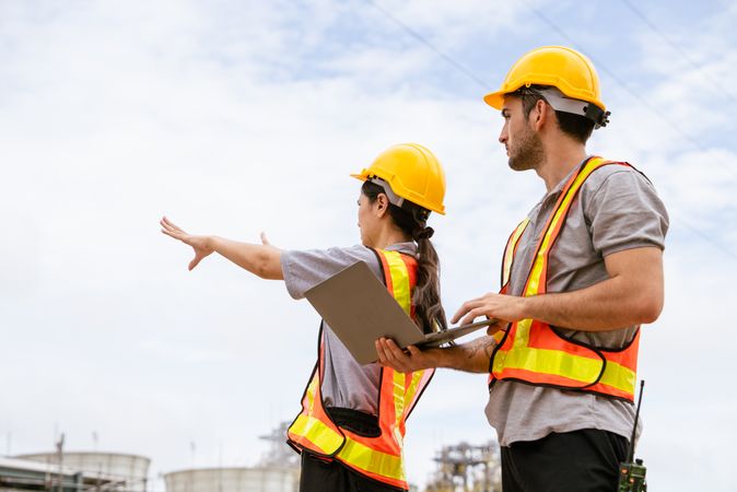 Engineer worker checking project at petrochemical factory or refinery oil plant industrial.