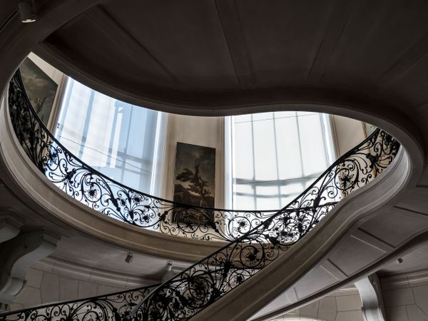 A chic twisted staircase in the Art Nouveau style in Paris. Museum Small Palace.