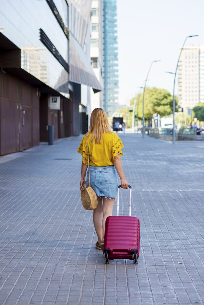 Young woman traveler going on holiday