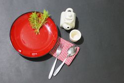 Dinnerware setting with a Touch of Red and Black