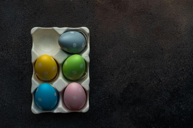 Carton of decorative pastel Easter eggs