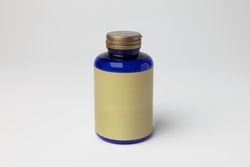 Mockup of a magnesium bottle, food supplement, closed, blue color, with label