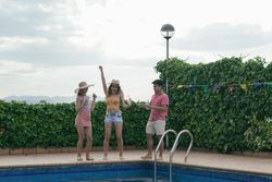 Group of friends having a pool party