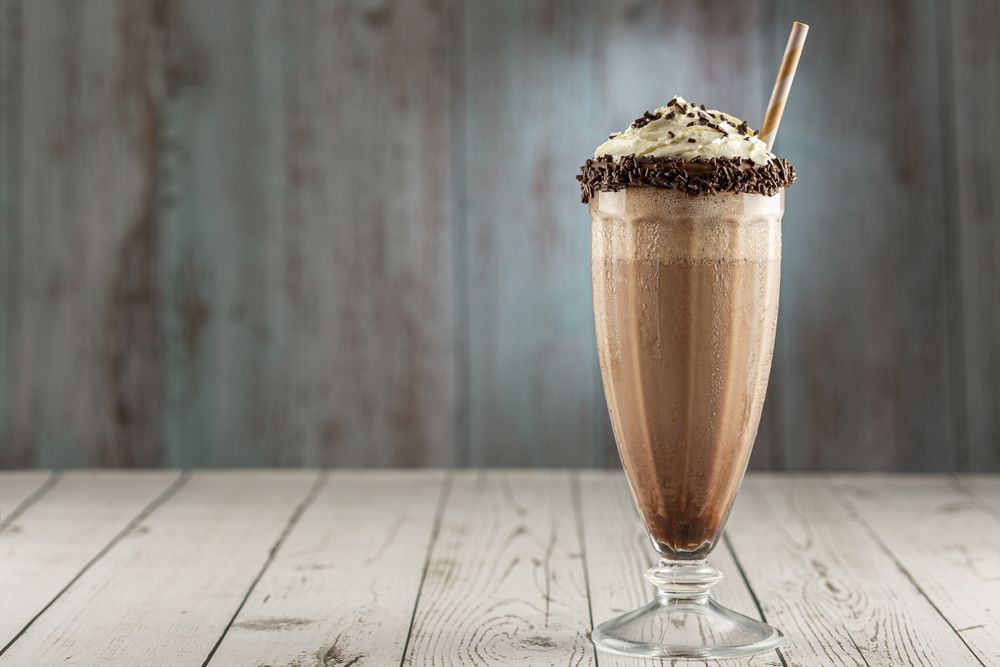 Chocolate milkshake with whipped cream.