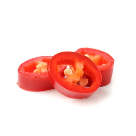 Chilli pepper slices isolated on plain background