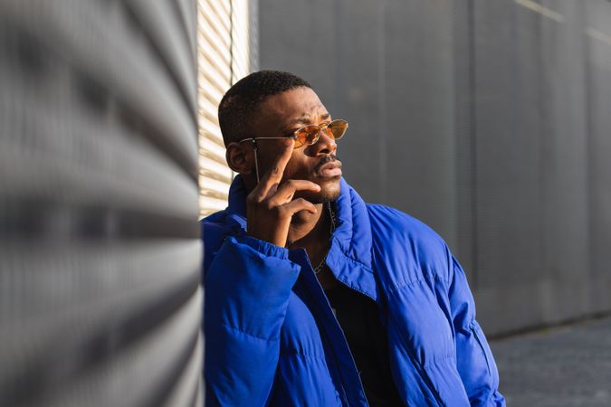 Stylish Black man in sunglasses on street