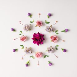 Circular flower arrangement on light background