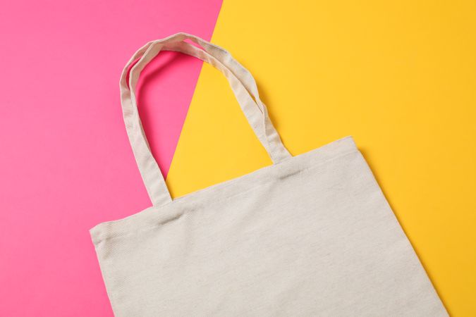 Eco bag on two color background, space for text