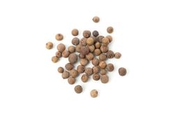Looking down at loose peppercorns